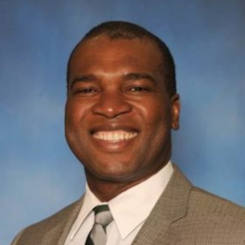 Headshot of Chika C. Okafor, DVM, MS, PhD, DACVPM (Epi)